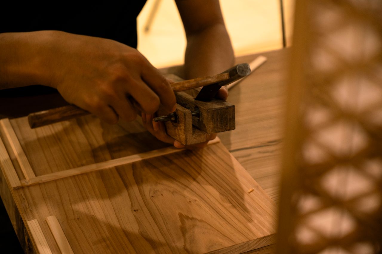hero-img-01 Artisan carefully crafting wood with traditional hand tools, showcasing skill and precision.