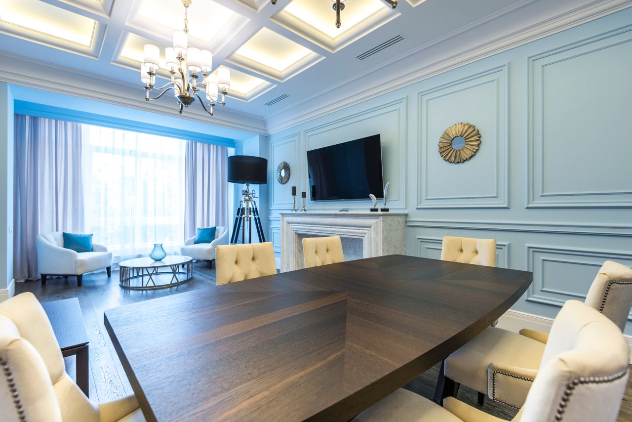 about-02 Elegant dining room interior featuring modern design, luxurious decor, and soft lighting.